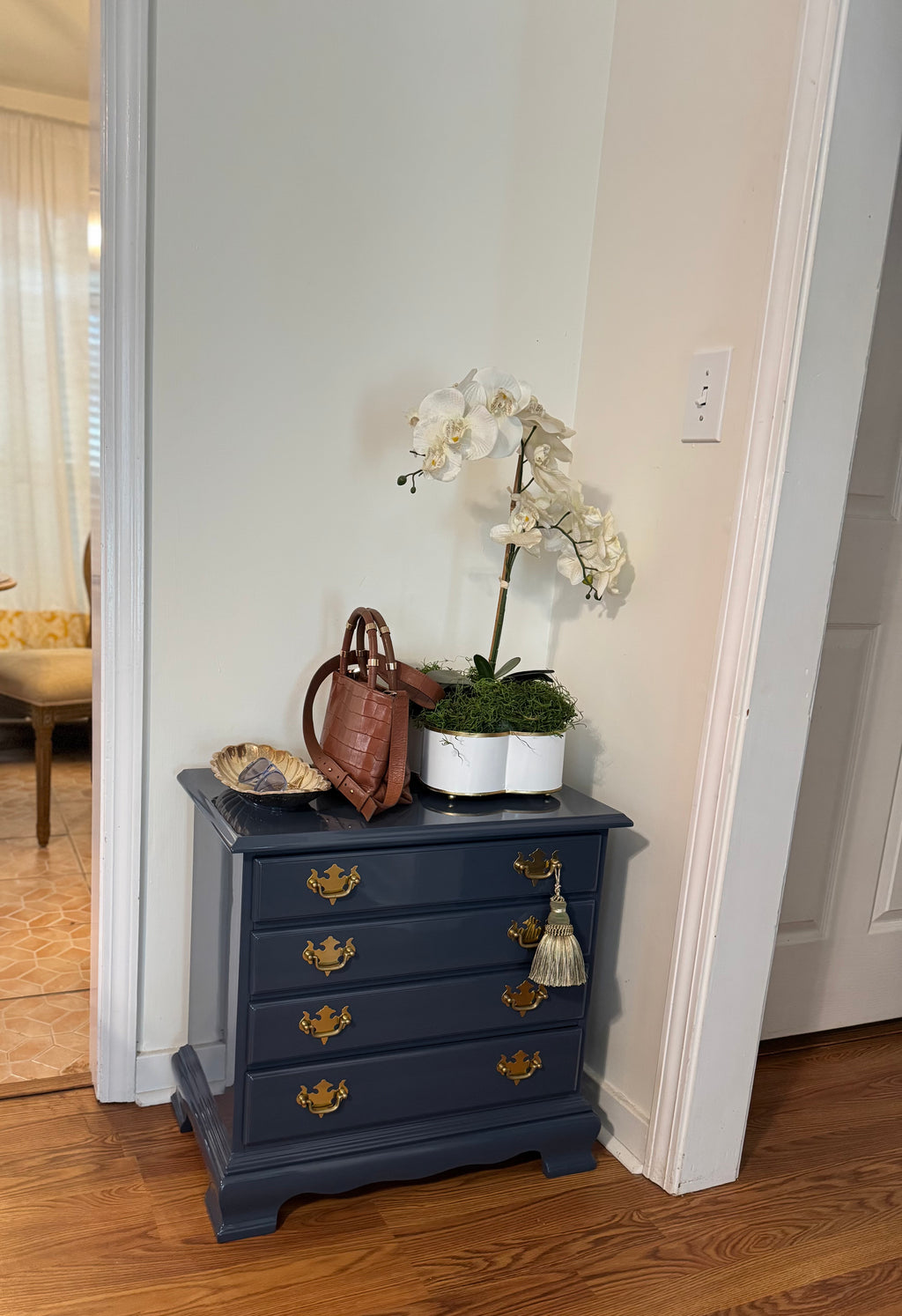 white and gold metal cachepot planter